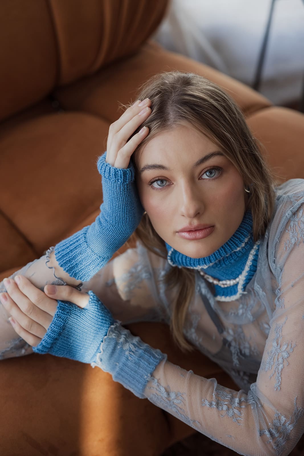 Model wearing knitwear from As They Kiss Consume. Photo by Solitude Creative. Photography for conscious brands