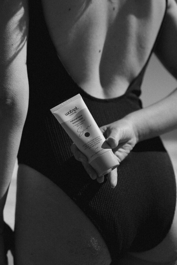 Black and White version of a product shot featuring Wot Not natural face sunscreen. 